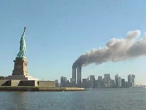 300px-National_Park_Service_9-11_Statue_of_Liberty_and_WTC_fire
